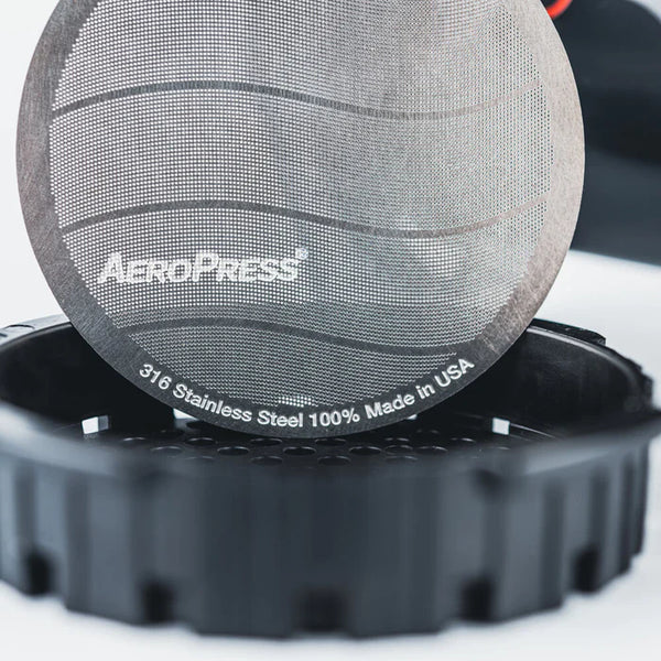 aeropress filter being installed into the aeropress